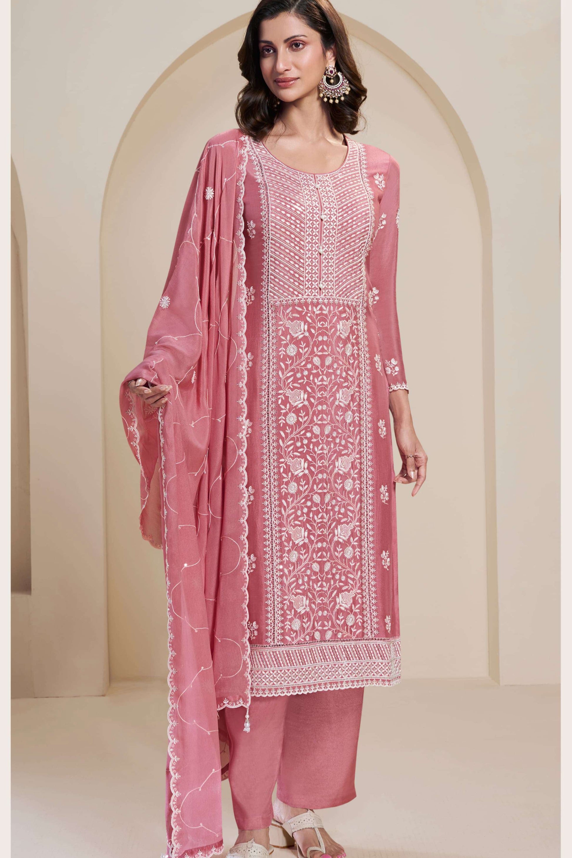 Pink salwar kameez is cheerful and lovely. Perfect for celebrations.
