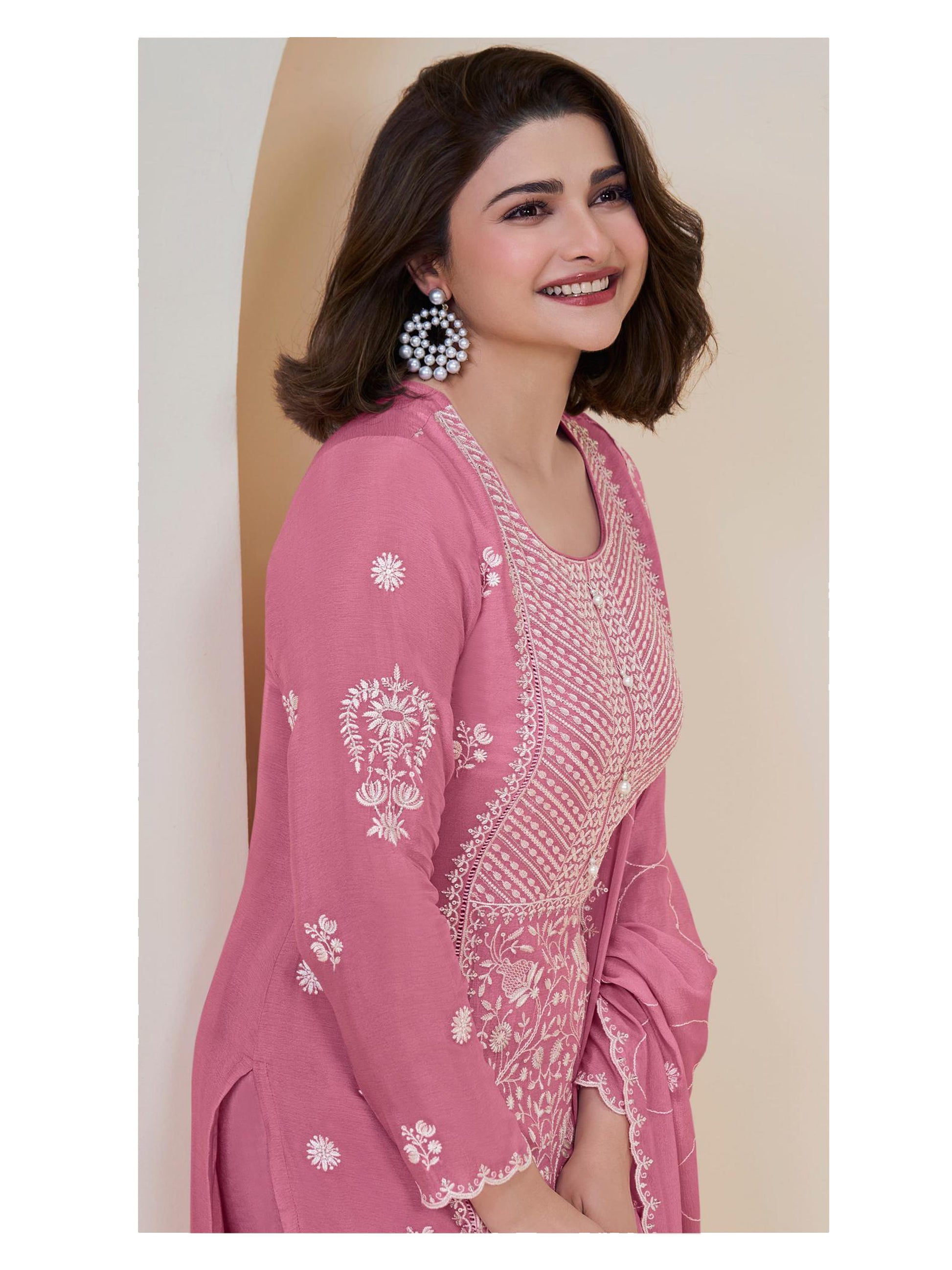 Pink salwar kameez is cheerful and lovely. Perfect for celebrations.
