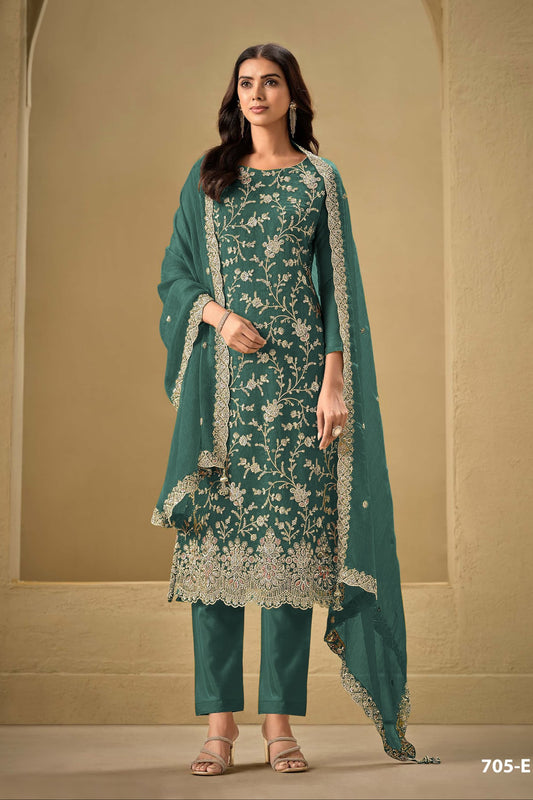 Teal salwar kameez is cool and refreshing. It blends blue and green for a unique look