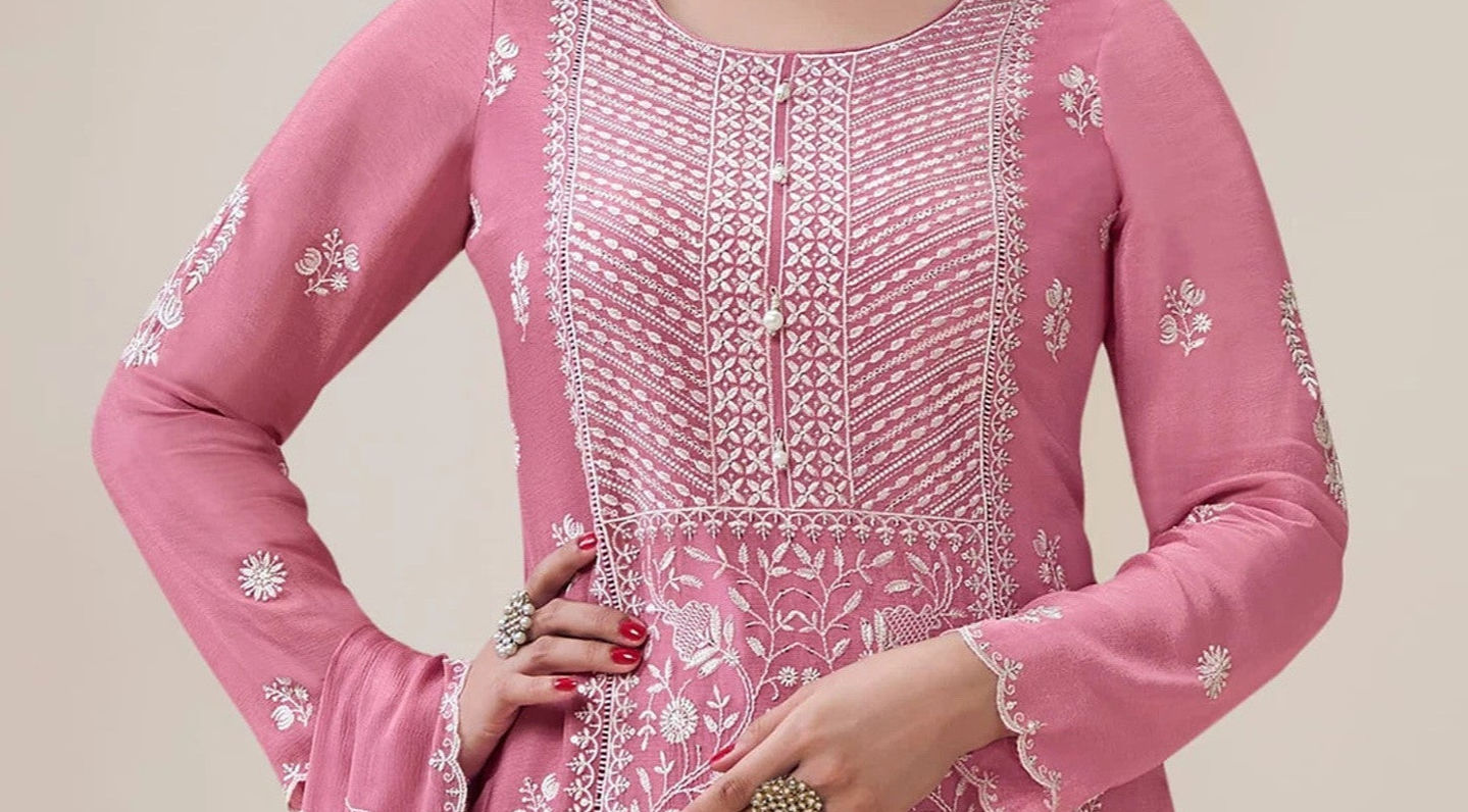 Pink salwar kameez is cheerful and lovely. Perfect for celebrations.
