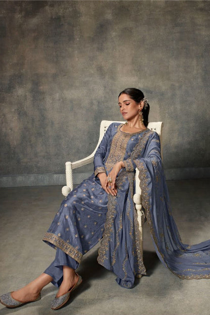 Grey salwar kameez looks simple and stylish. Metallic accents make it modern.
