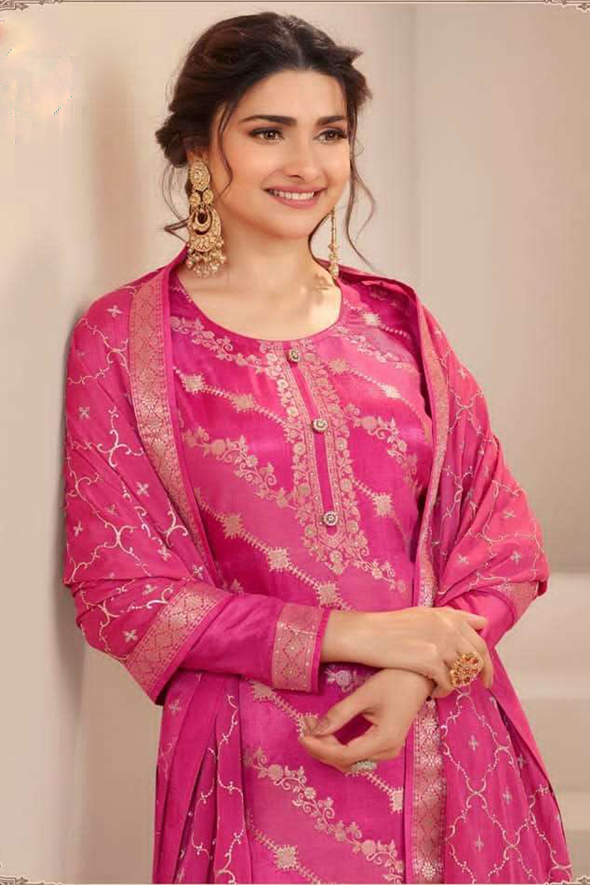 Pink salwar kameez is cheerful and lovely. Perfect for celebrations.
