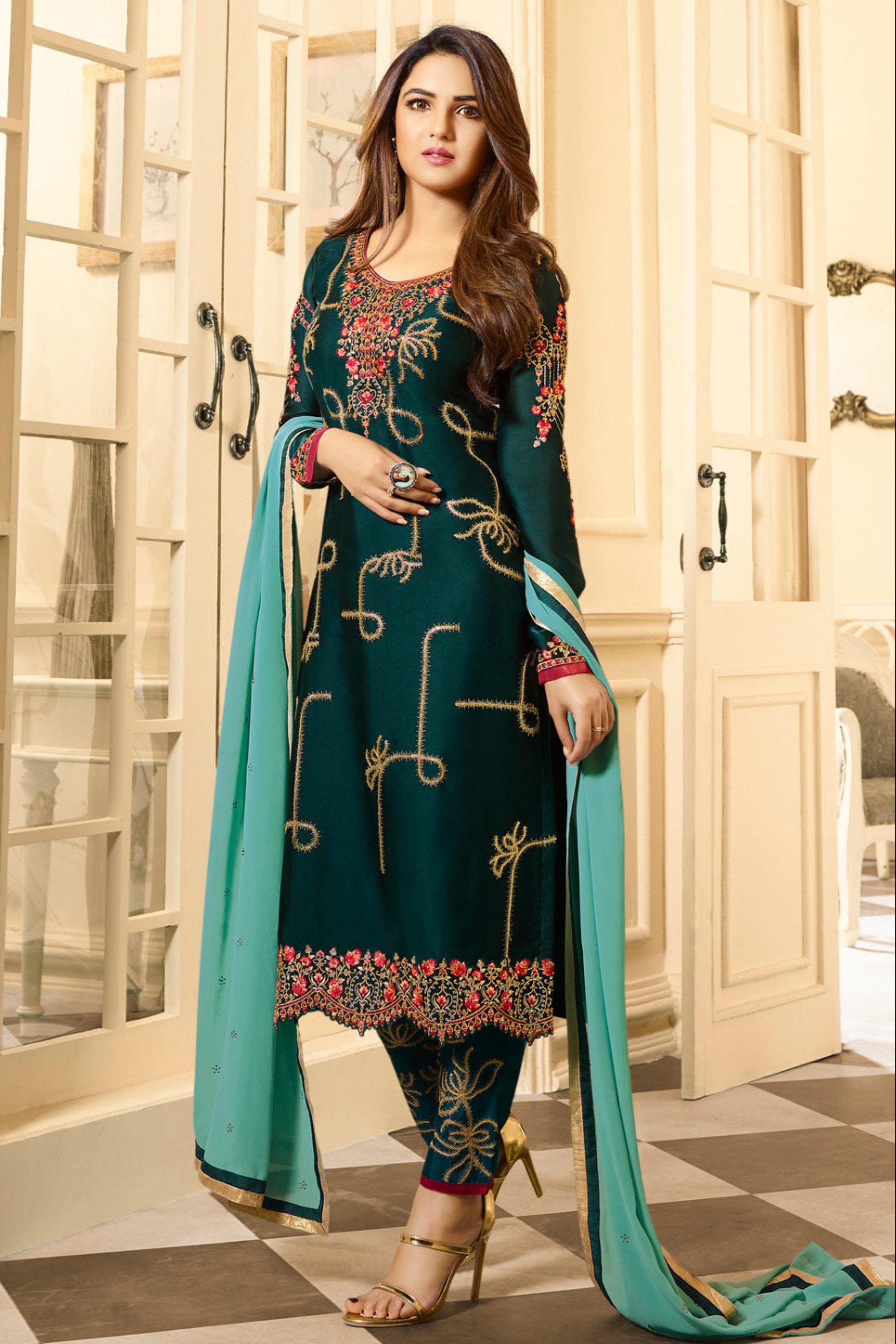 Teal salwar kameez is cool and refreshing. It blends blue and green for a unique look