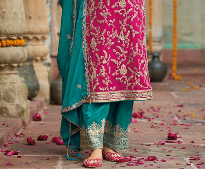 Pink salwar kameez is cheerful and lovely. Perfect for celebrations.
