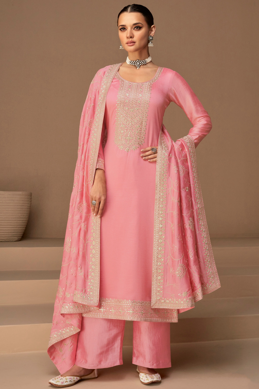 Pink salwar kameez is cheerful and lovely. Perfect for celebrations.
