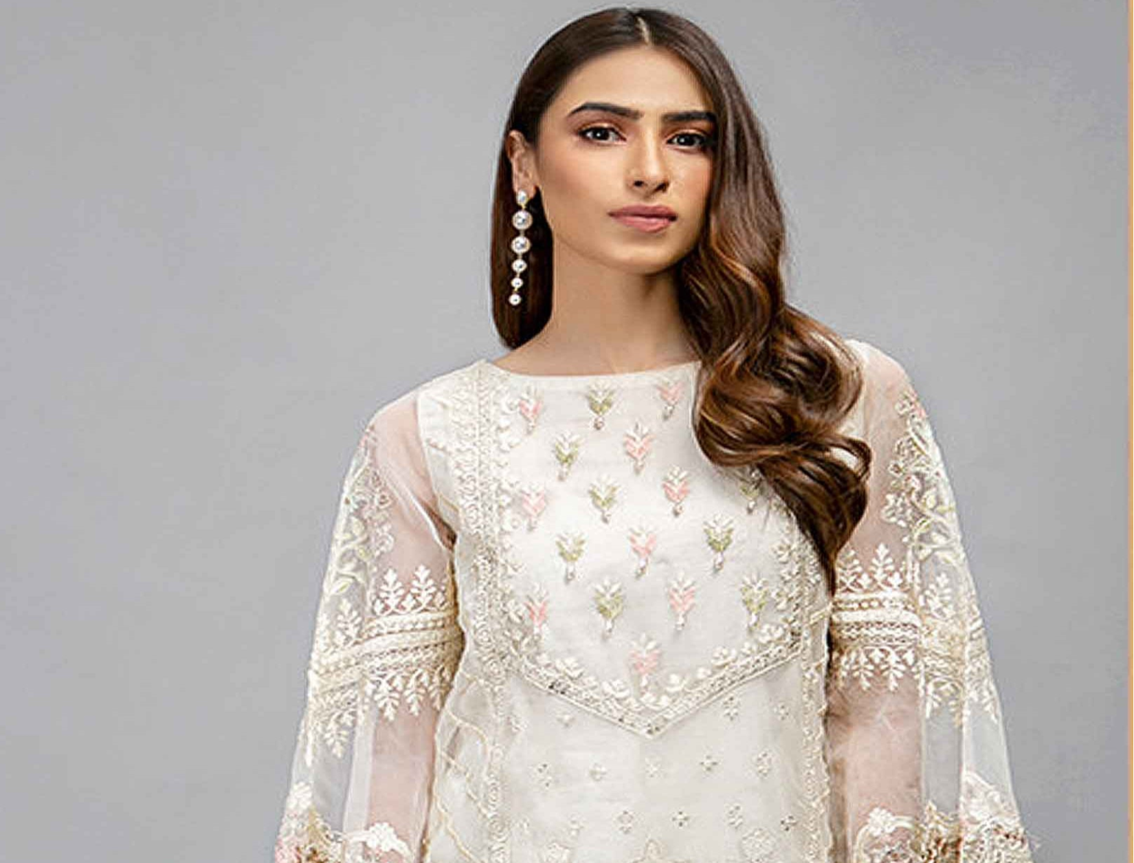White salwar kameez is pure and classic. Ivory with embroidery looks soft and pretty.
