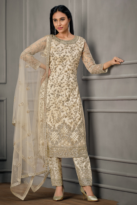 White salwar kameez is pure and classic. Ivory with embroidery looks soft and pretty.
