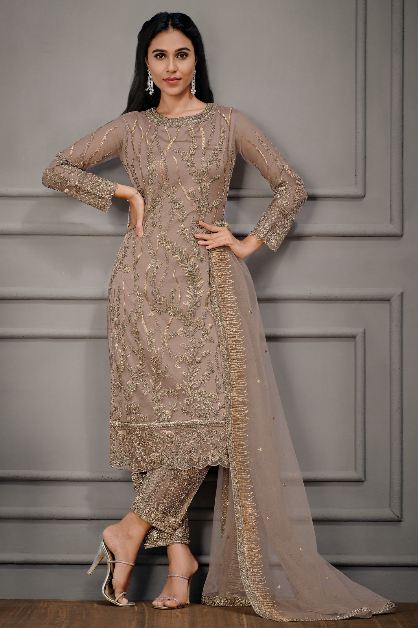 Brown salwar kameez gives a warm, grounded, and earthy feel