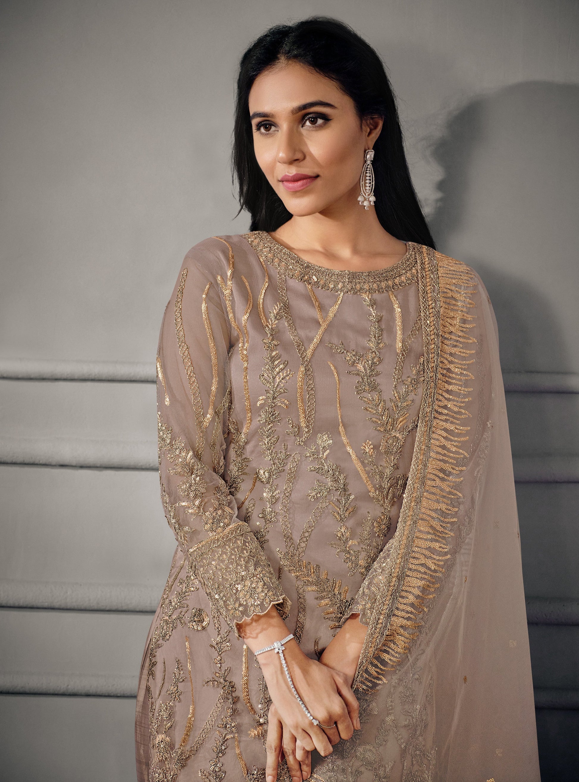 Brown salwar kameez gives a warm, grounded, and earthy feel