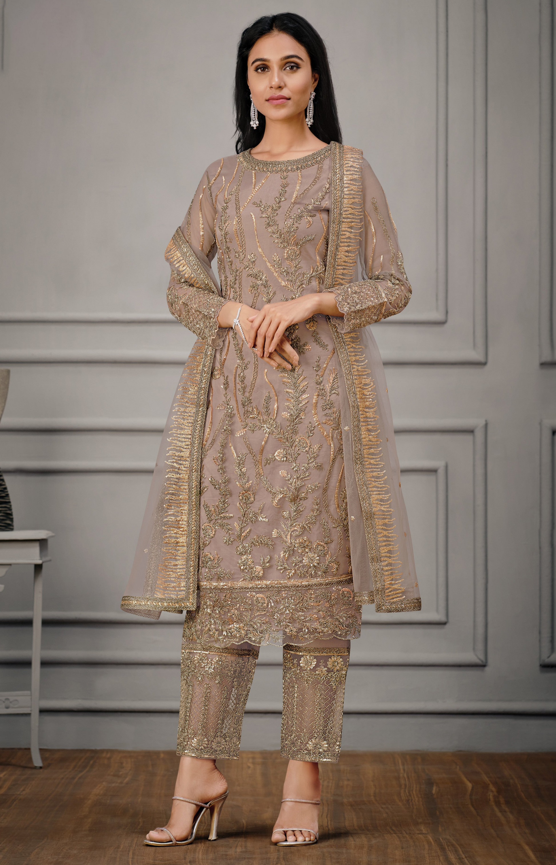 Brown salwar kameez gives a warm, grounded, and earthy feel