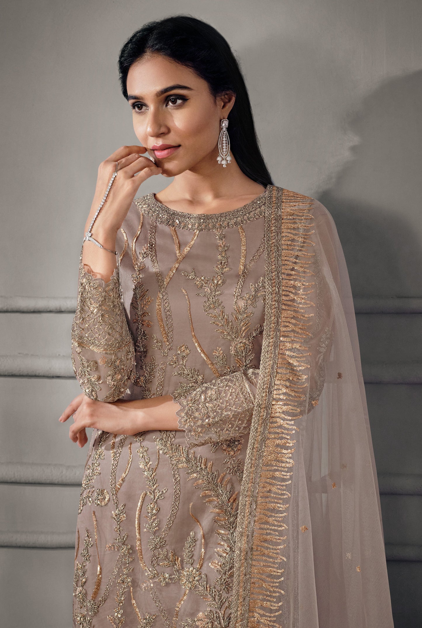 Brown salwar kameez gives a warm, grounded, and earthy feel