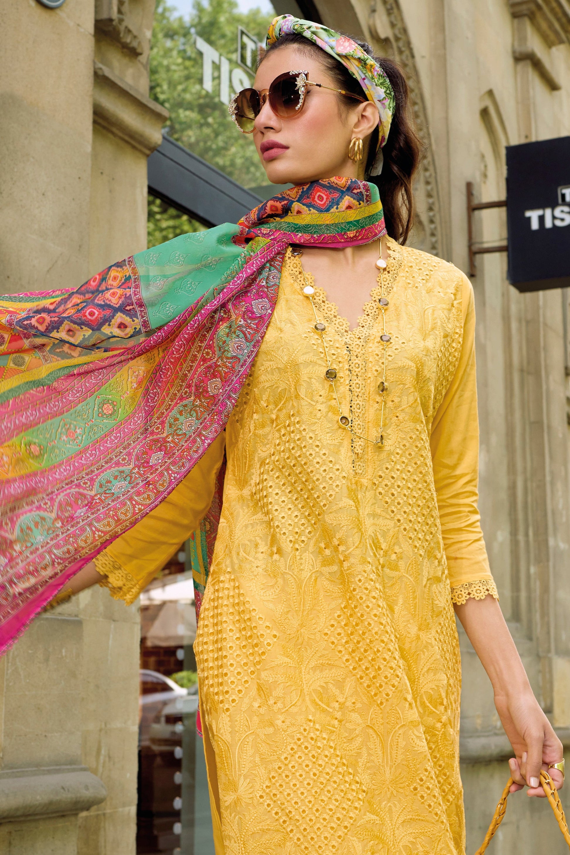 Yellow salwar kameez is bright and happy. Good for haldi or sunny events.
