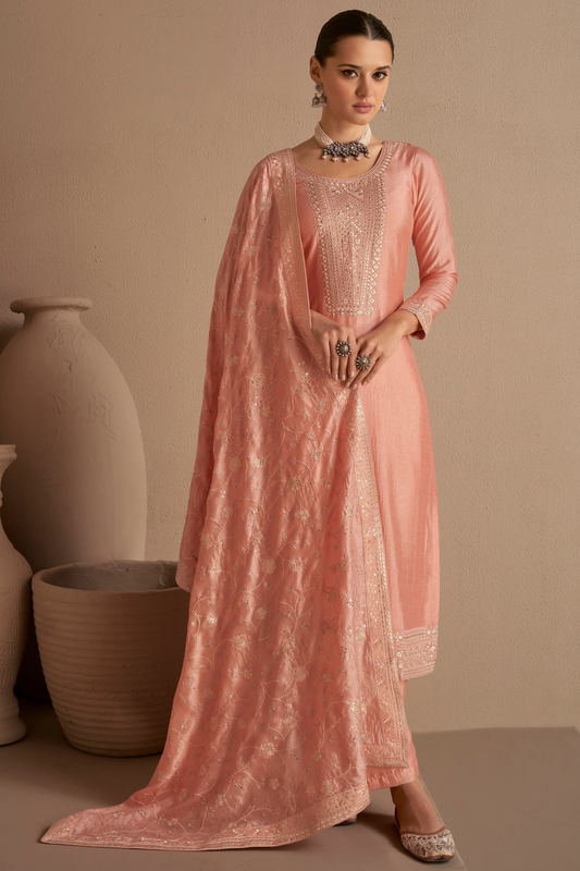 Peach salwar kameez brings soft elegance and warmth, perfect for daytime celebrations and festive charm.