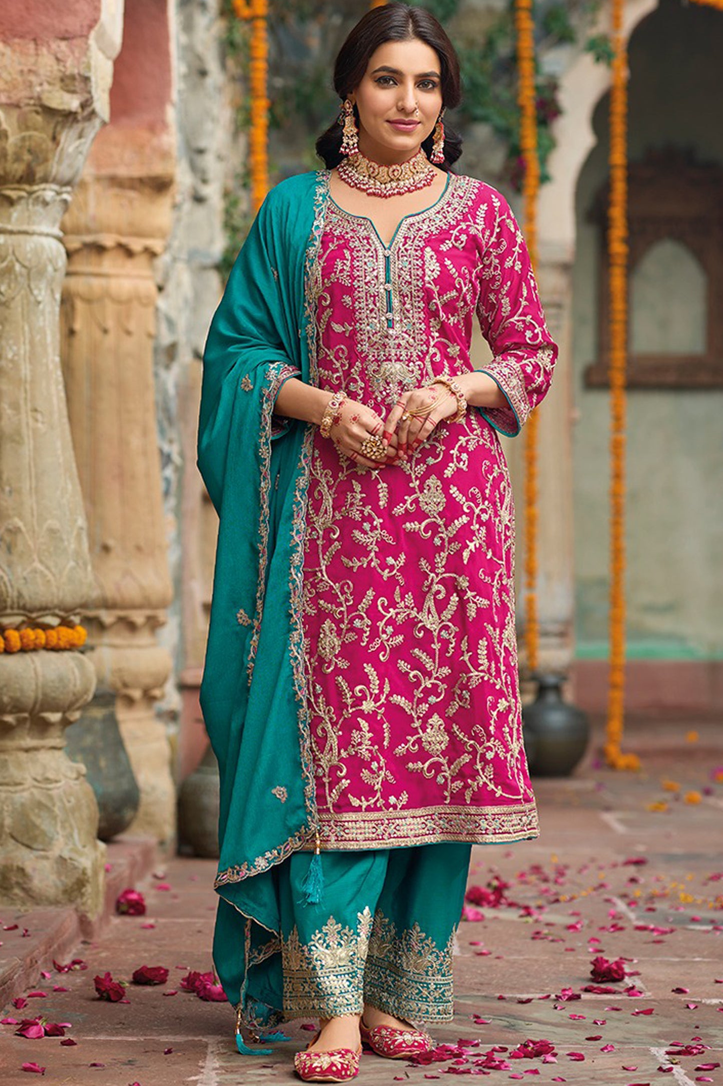 Pink salwar kameez is cheerful and lovely. Perfect for celebrations.
