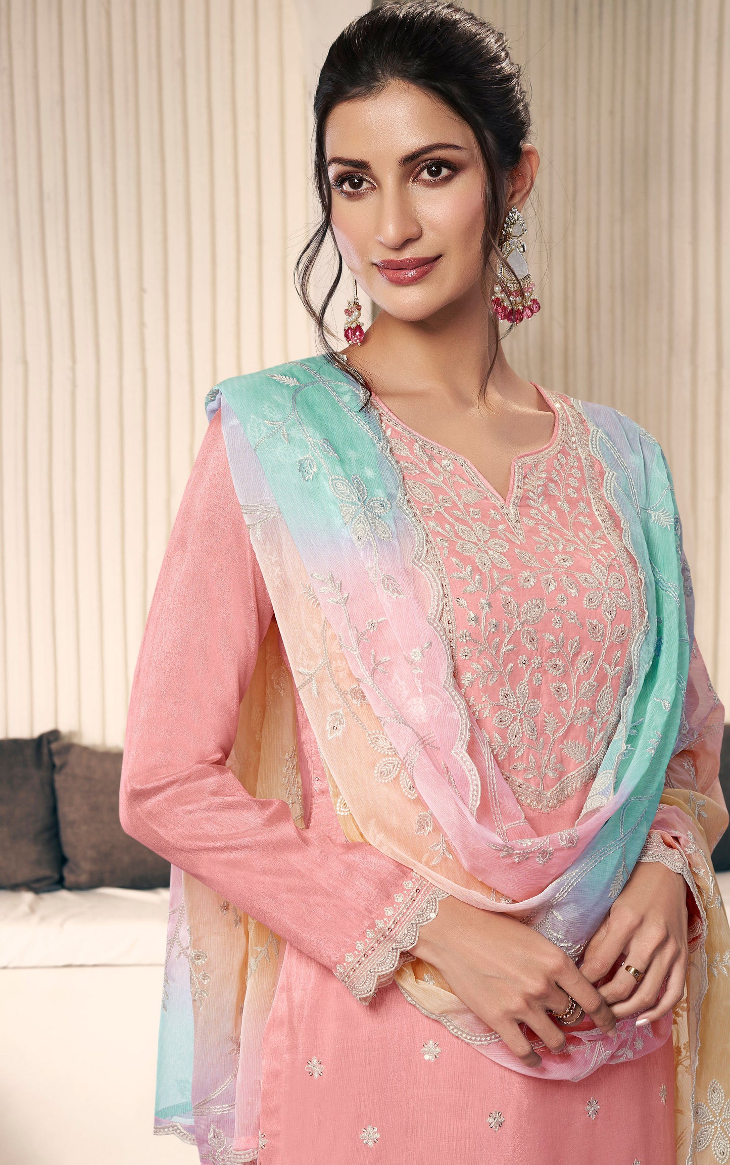 Orange salwar kameez is bright and lively. Perfect for festivals and happy events.
