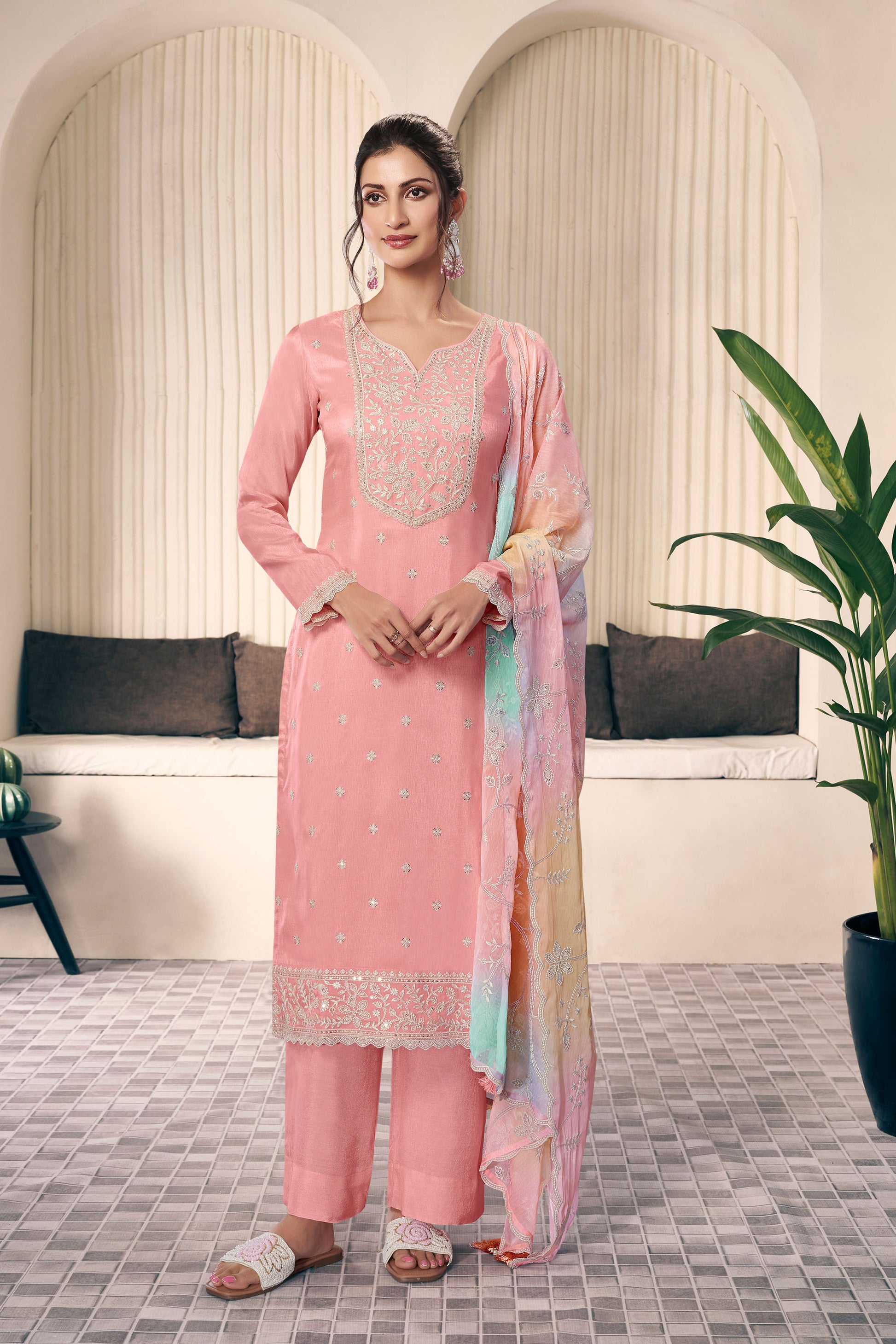 Orange salwar kameez is bright and lively. Perfect for festivals and happy events.
