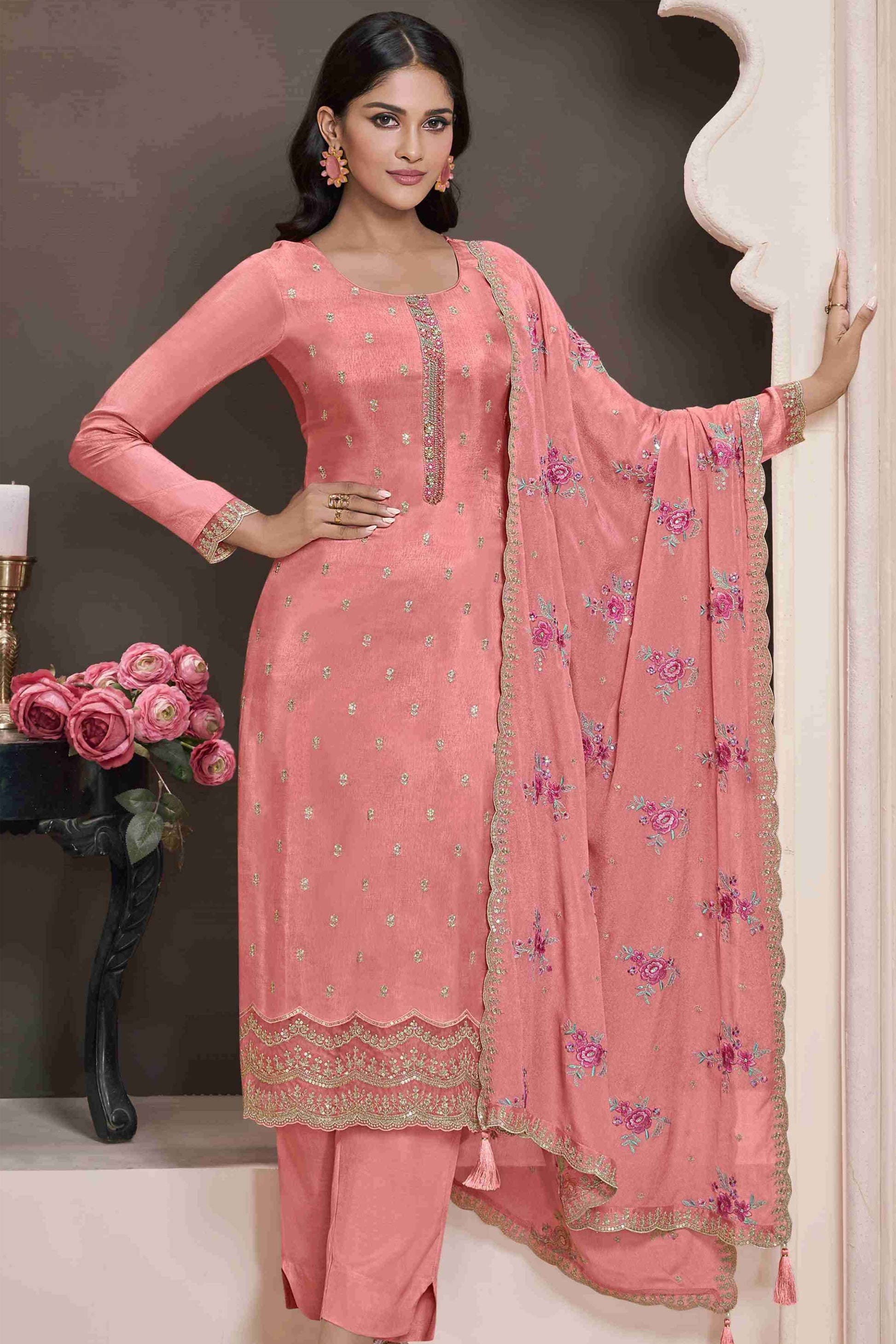 Peach salwar kameez brings soft elegance and warmth, perfect for daytime celebrations and festive charm.
