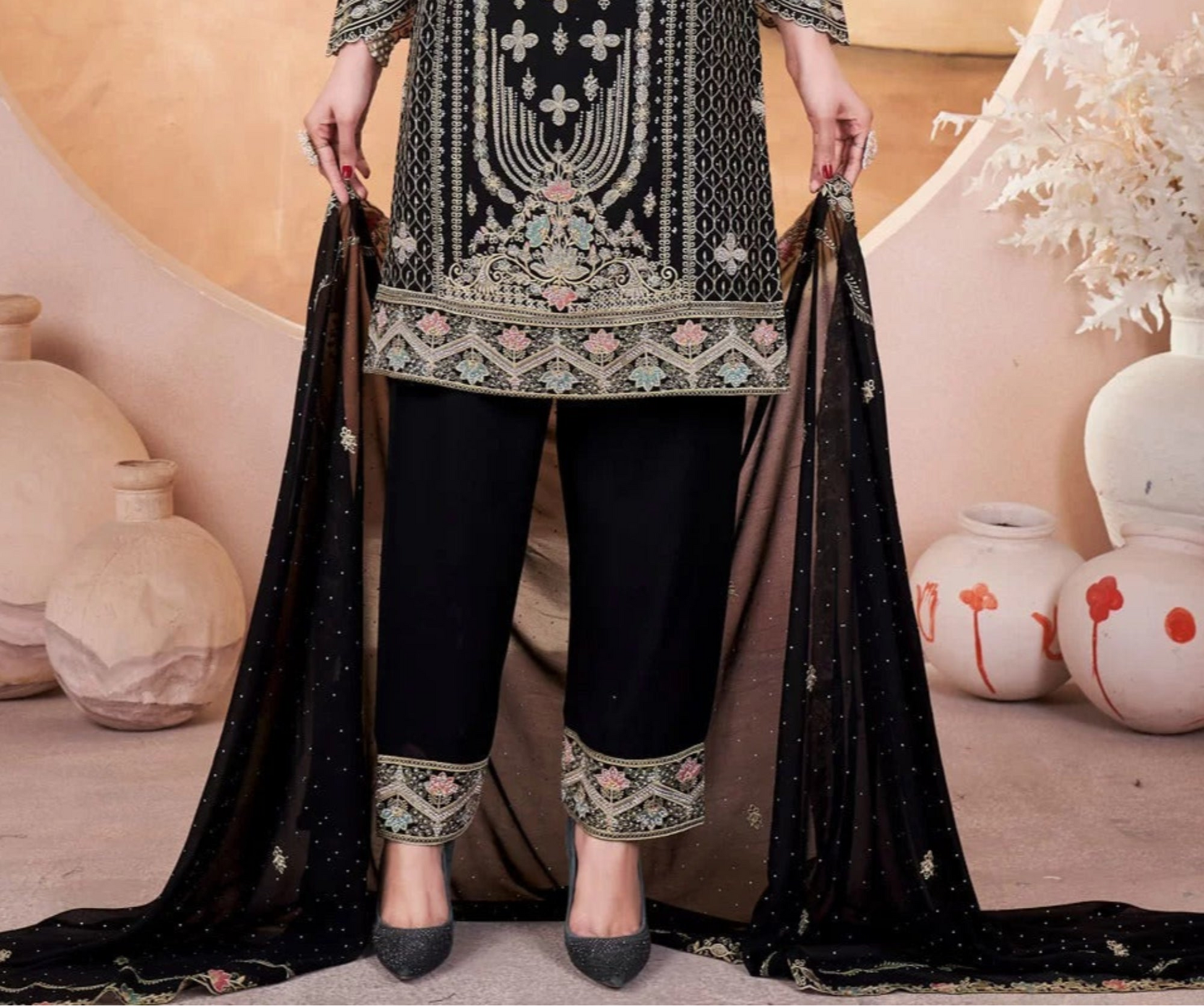 Black salwar kameez is always in fashion. It feels elegant and mysterious.
