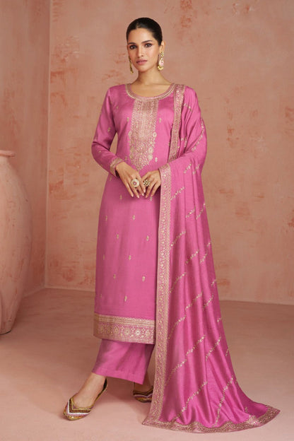 Pink salwar kameez is cheerful and lovely. Perfect for celebrations.
