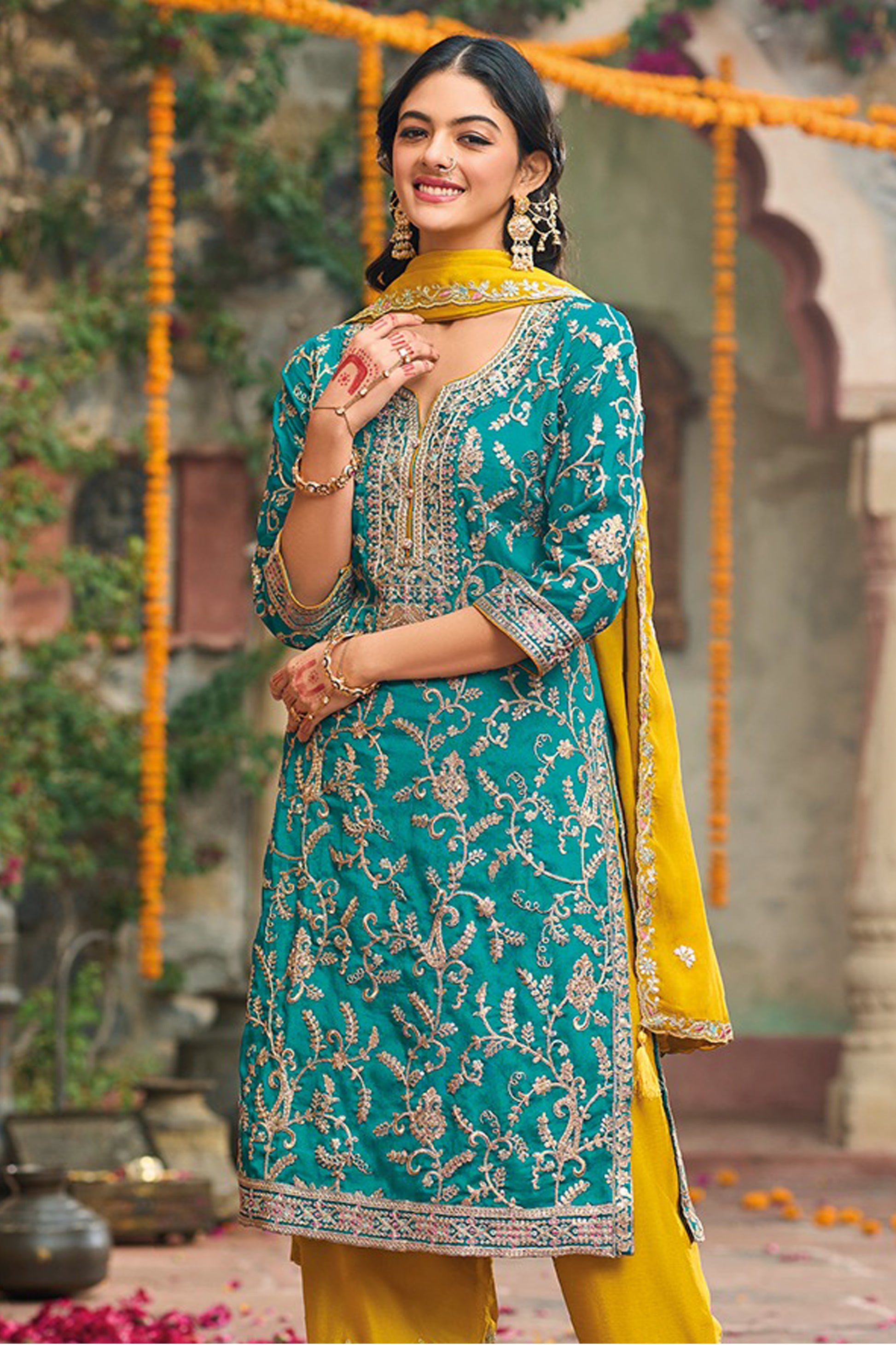 Blue salwar kameez feels calm and confident. Light or dark blue suits any time.
