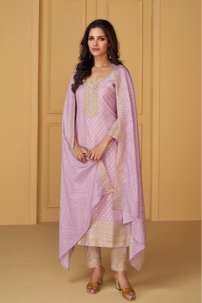 Pink salwar kameez is cheerful and lovely. Perfect for celebrations.
