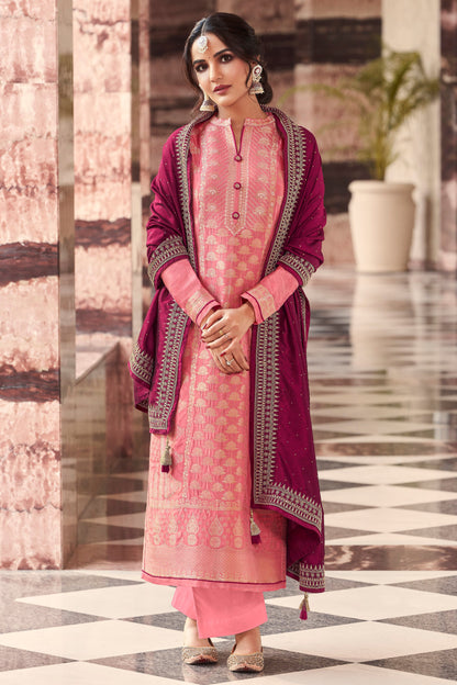 Pink salwar kameez is cheerful and lovely. Perfect for celebrations.
