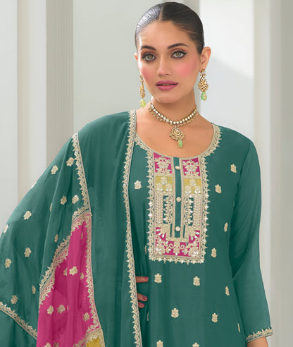 Teal salwar kameez is cool and refreshing. It blends blue and green for a unique look