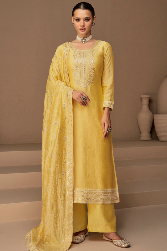 Yellow salwar kameez is bright and happy. Good for haldi or sunny events.
