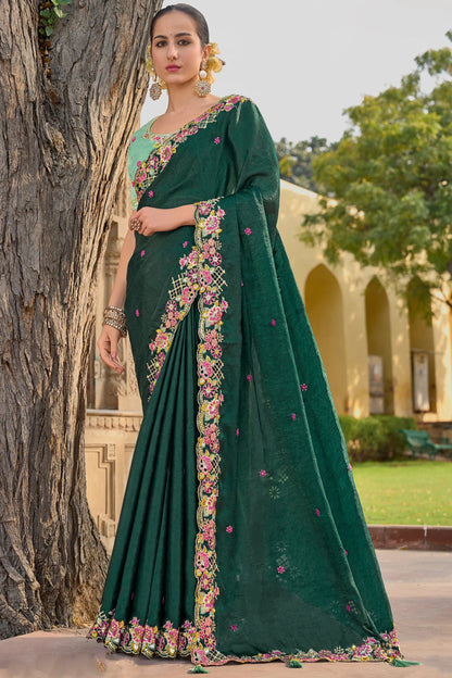 Green Saree symbolizes freshness and festivity – great for Mehndi or family gatherings.
