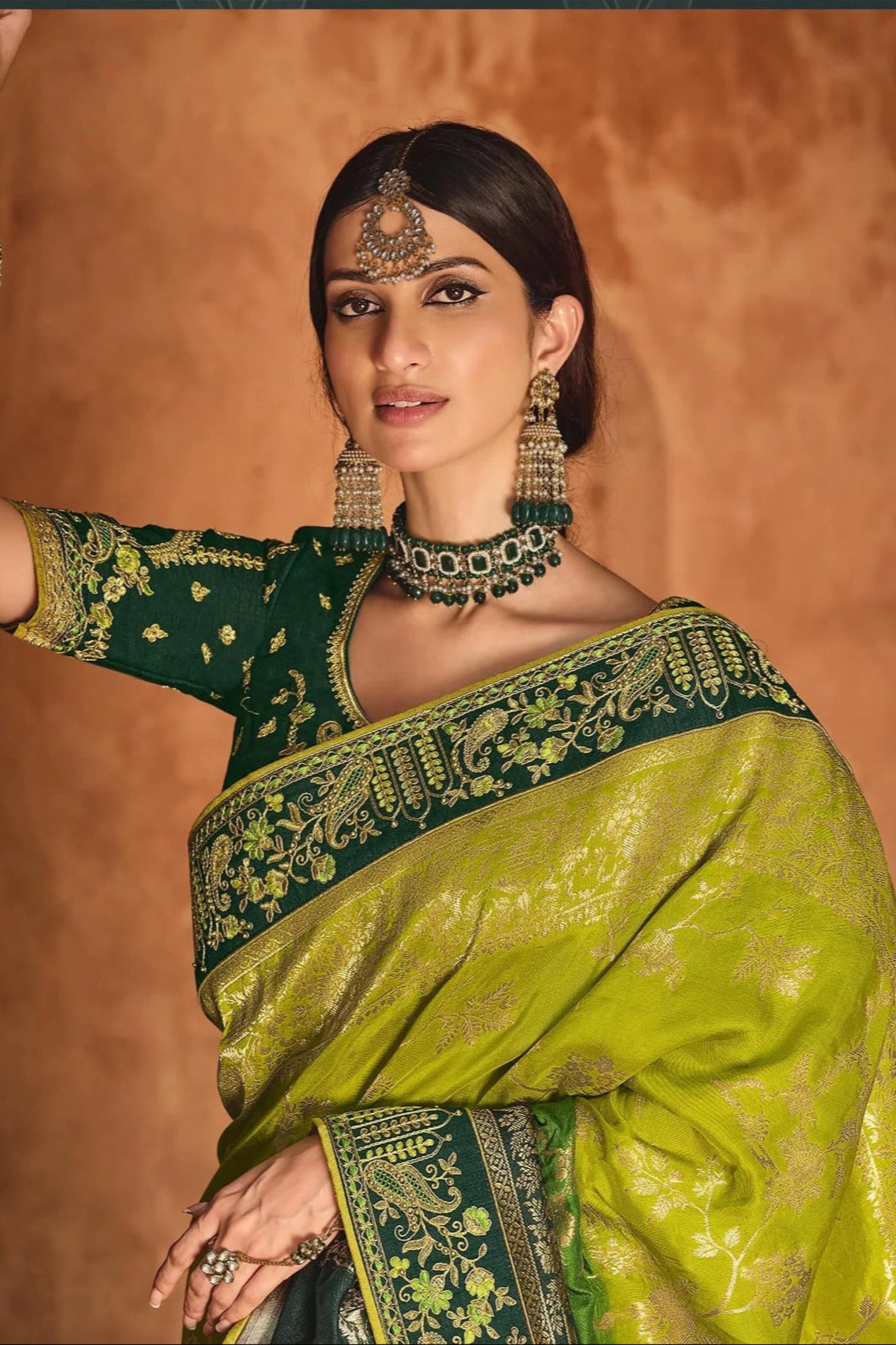 Green Saree symbolizes freshness and festivity – great for Mehndi or family gatherings.

