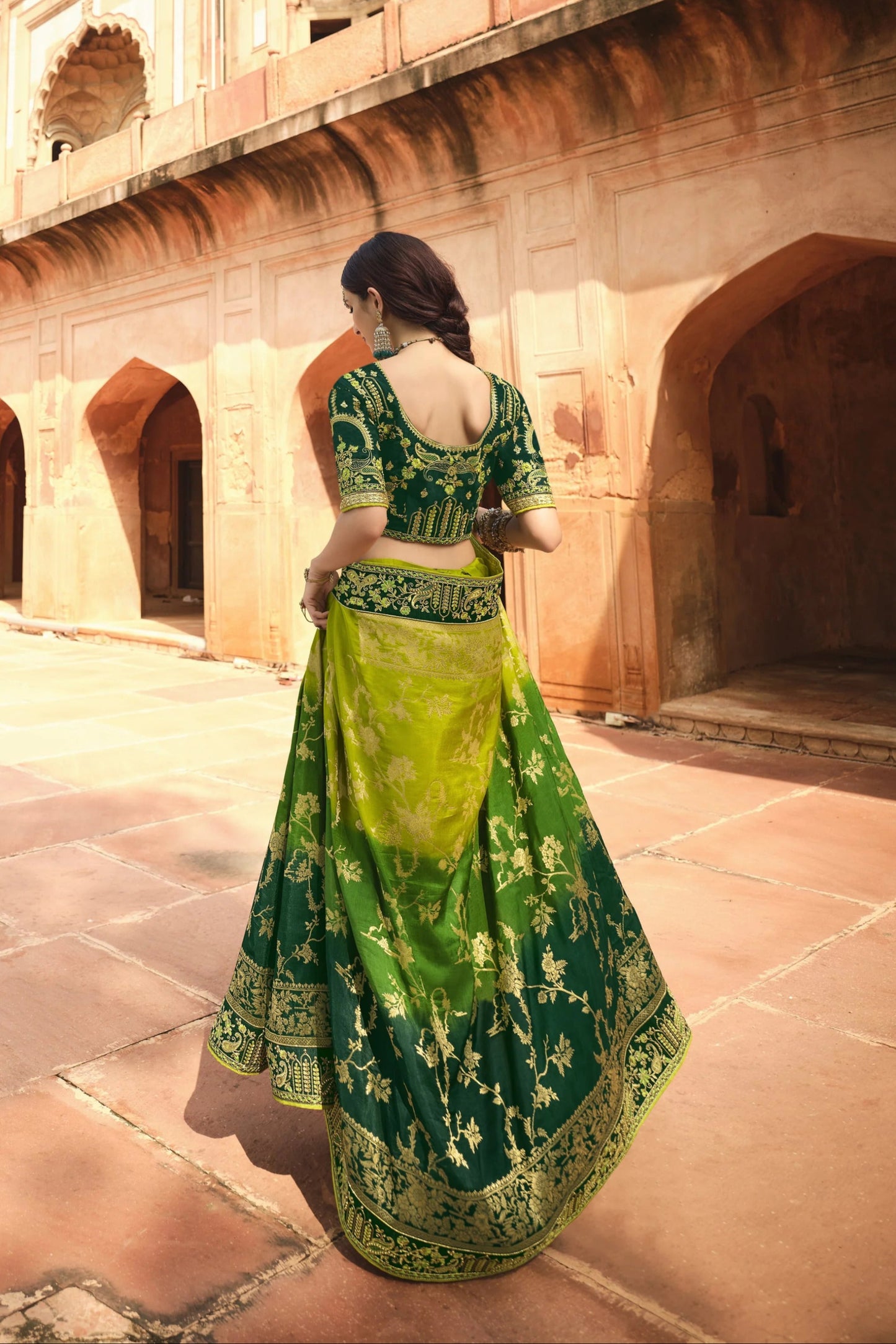 Green Saree symbolizes freshness and festivity – great for Mehndi or family gatherings.

