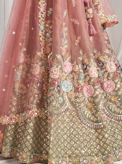 Pink bridal silk lehenga with mirror work luxury design