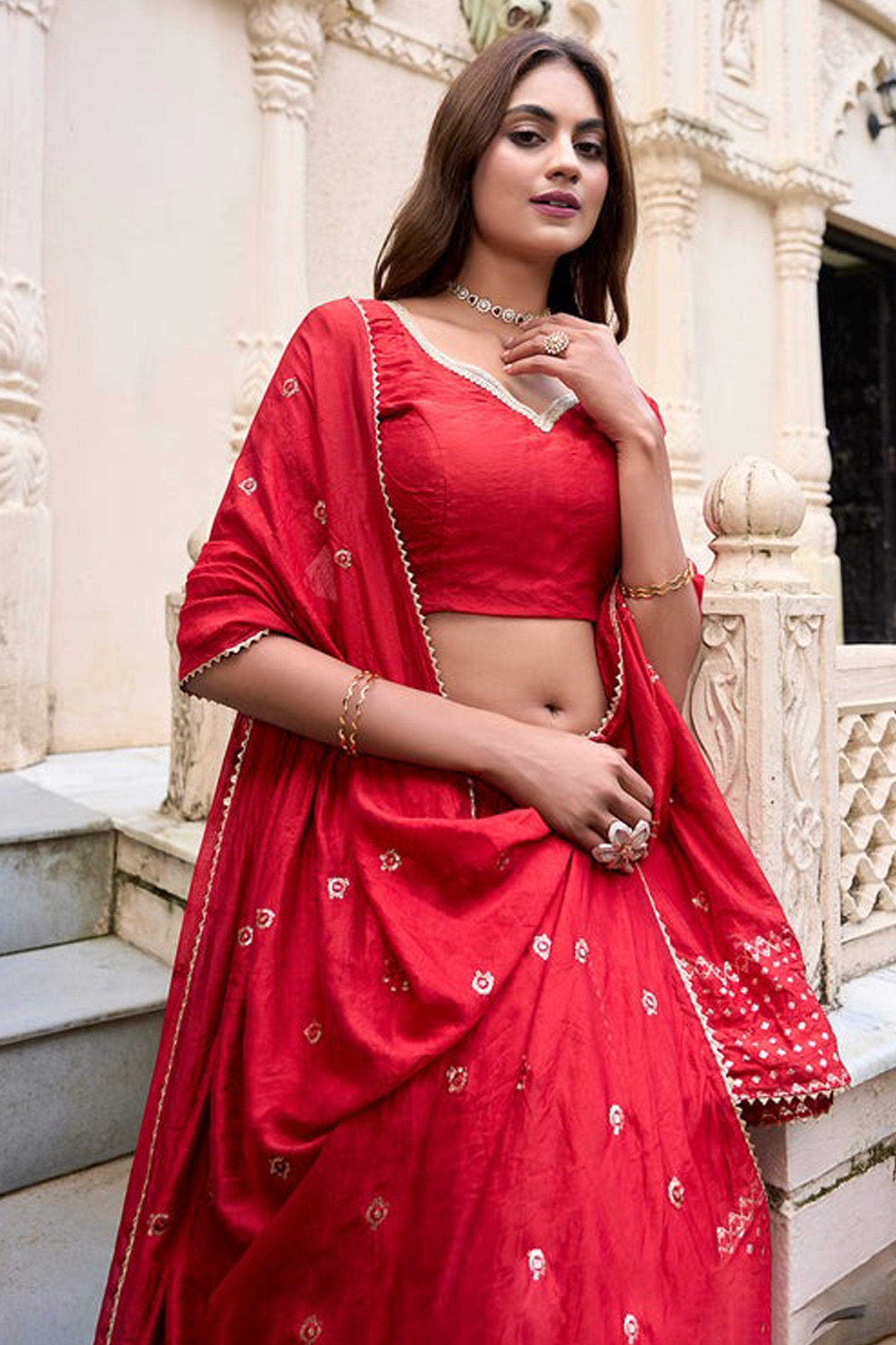"Chic lehengas for Holi events in America."
