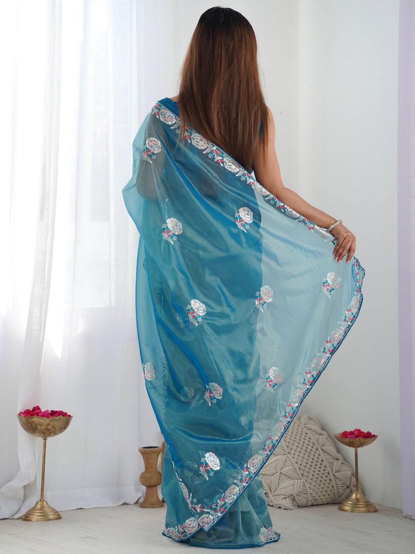 Stunning sky blue silk saree with embroidery for traditional wear.