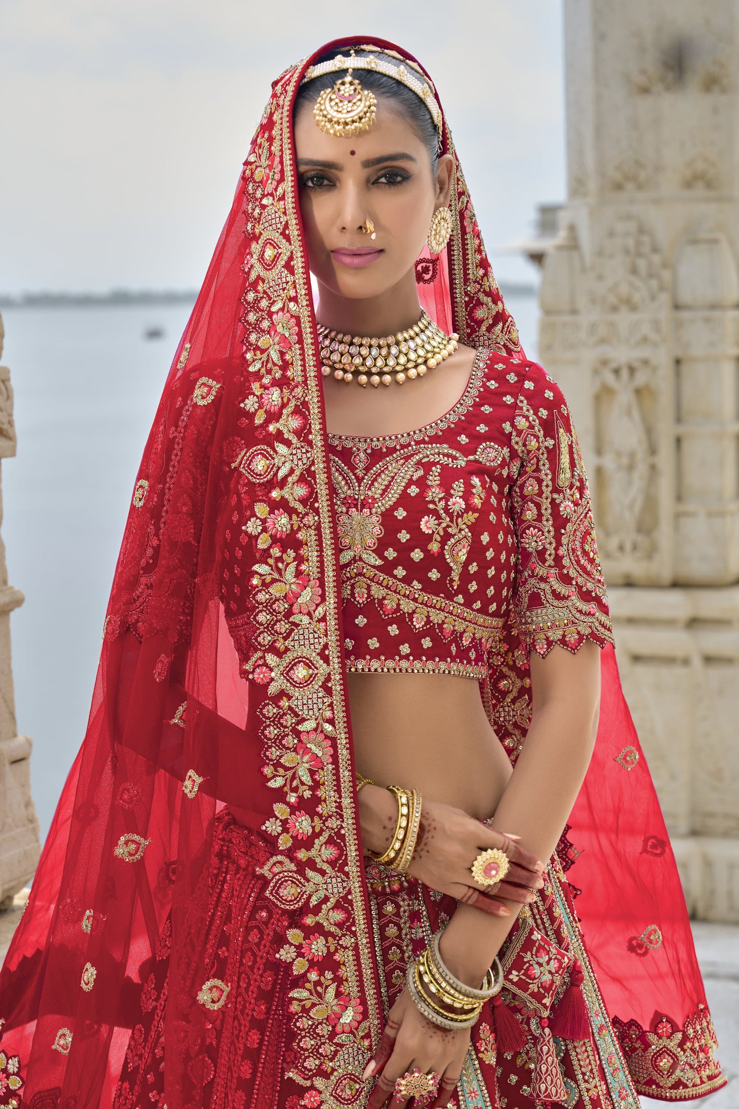 "Runway Red: Statement Bridal Lehenga with Contemporary Flair"
