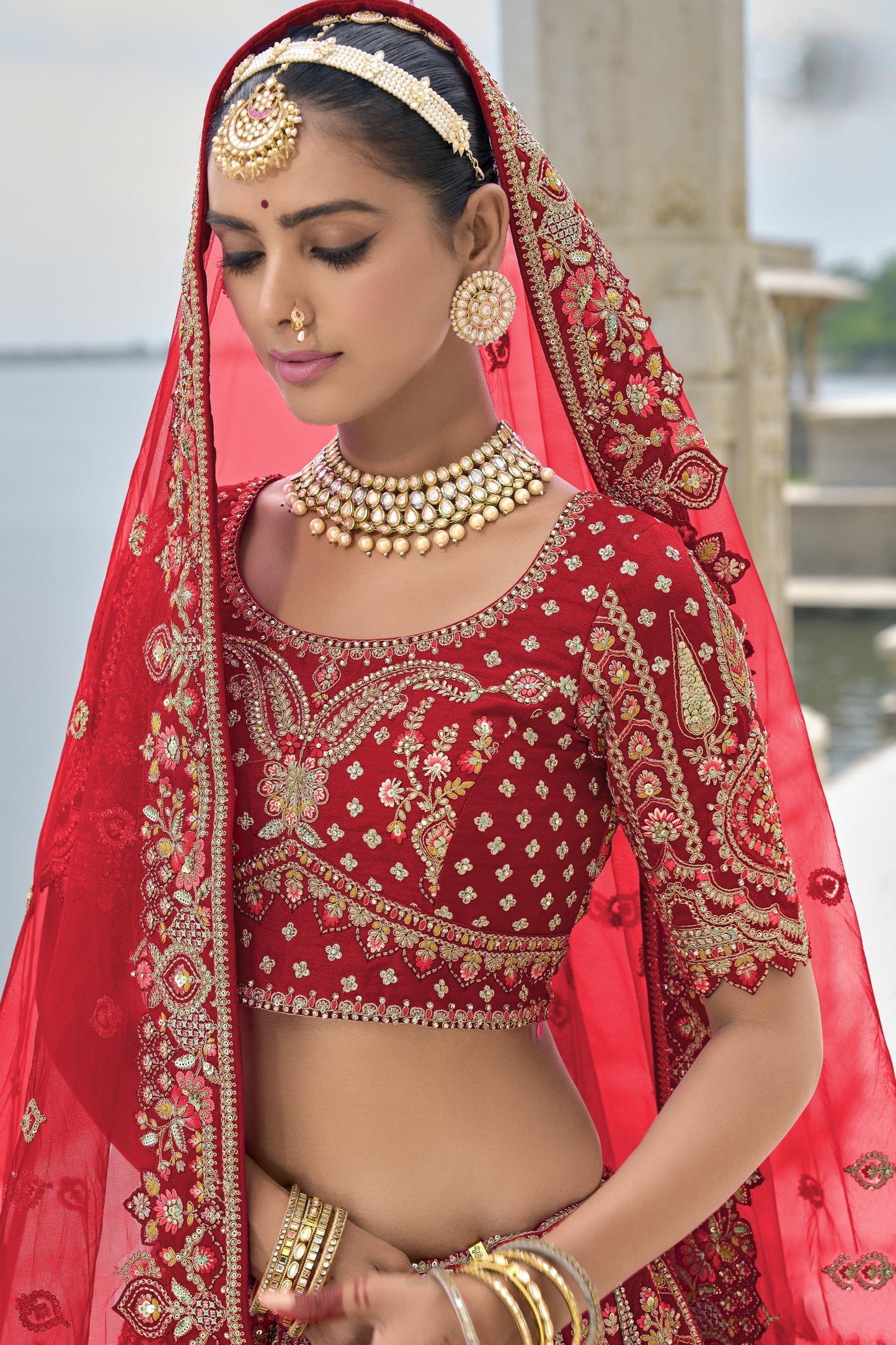 "Runway Red: Statement Bridal Lehenga with Contemporary Flair"
