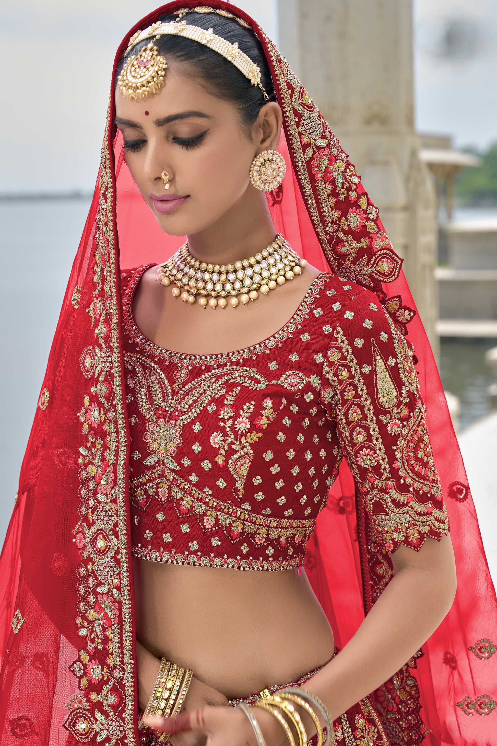 "Runway Red: Statement Bridal Lehenga with Contemporary Flair"
