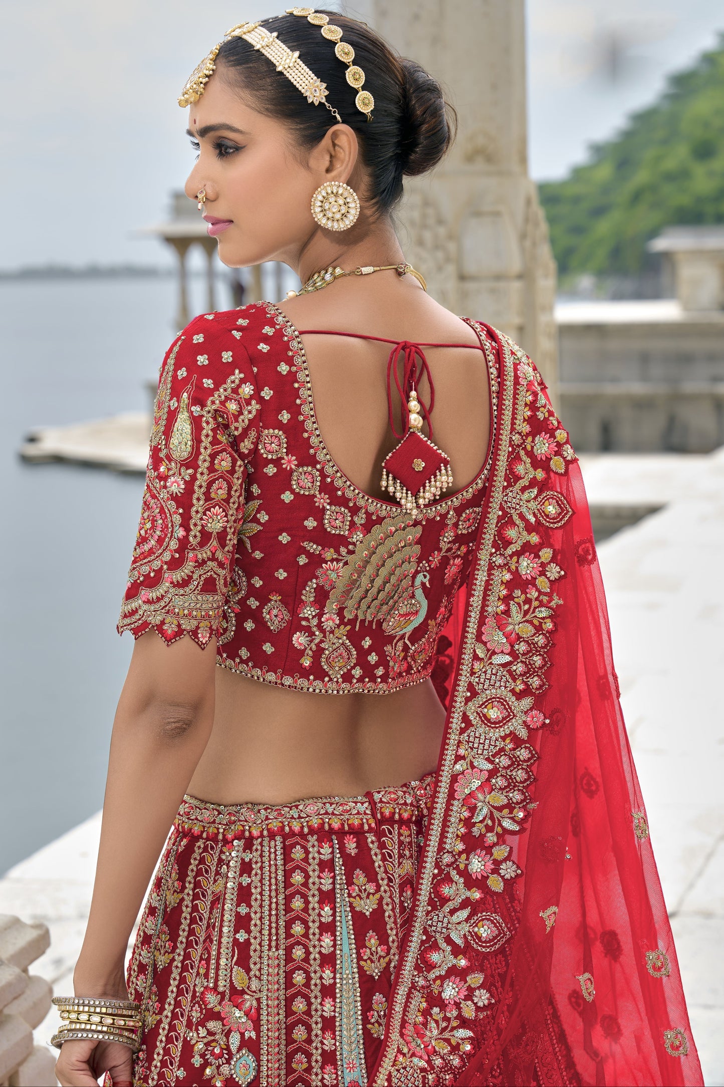 "Runway Red: Statement Bridal Lehenga with Contemporary Flair"
