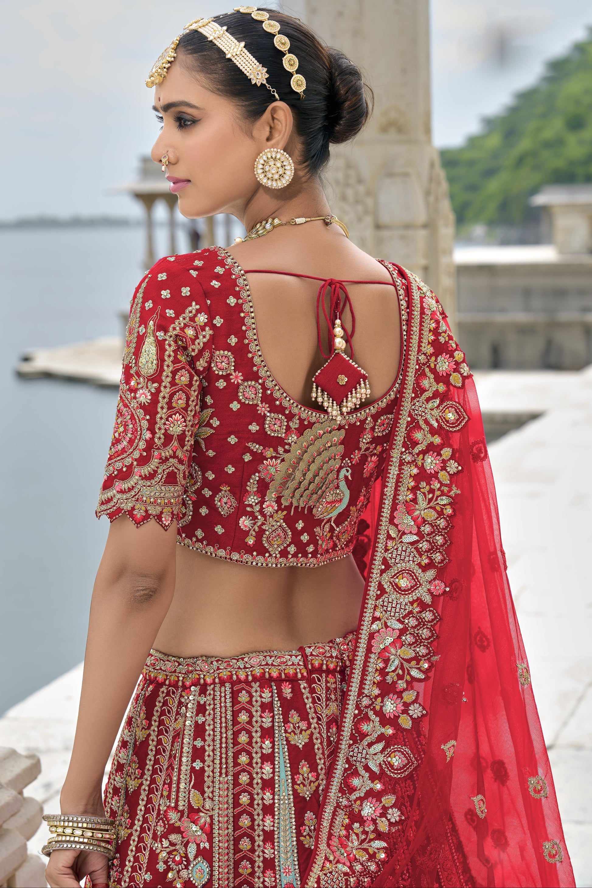 "Runway Red: Statement Bridal Lehenga with Contemporary Flair"
