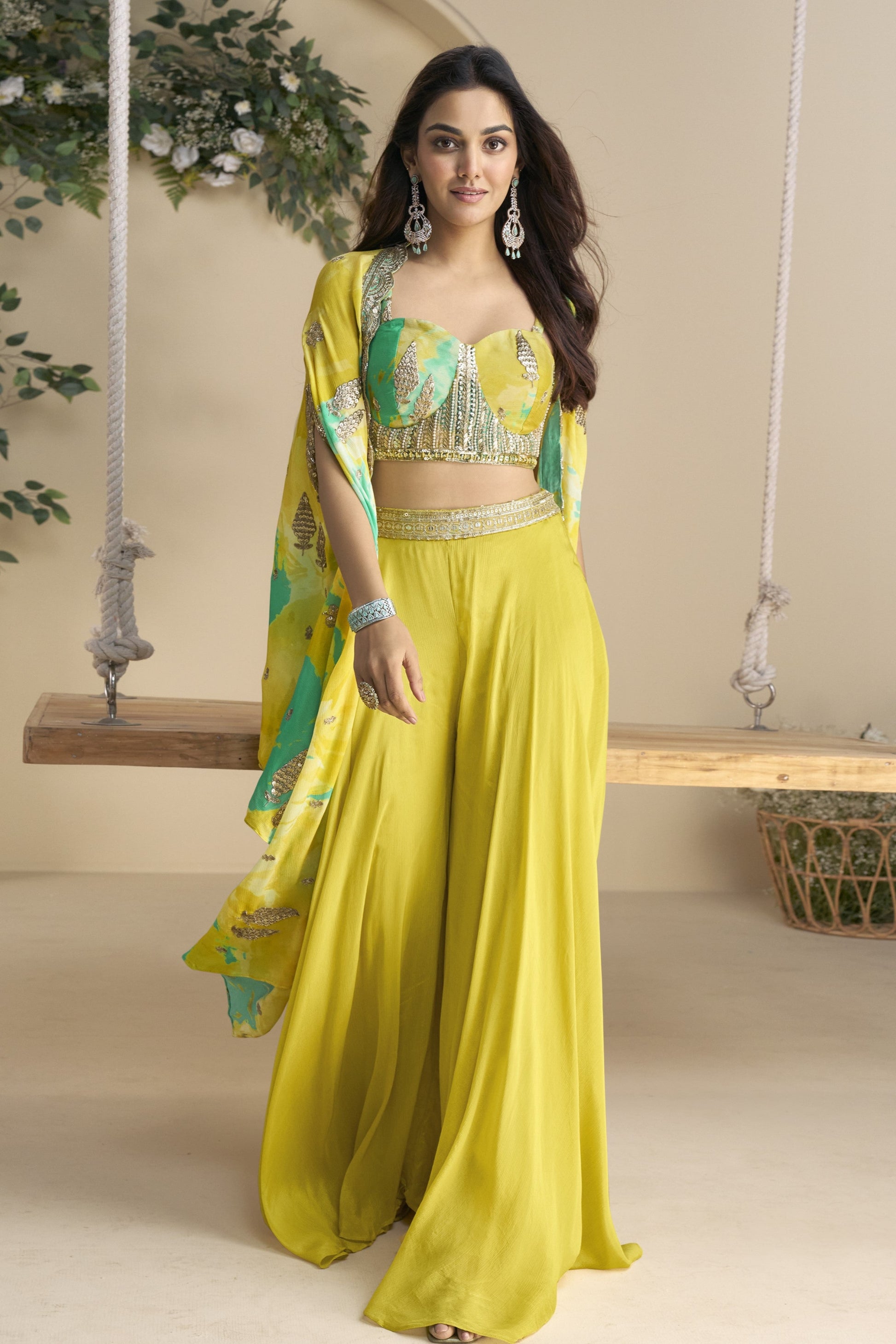 Yellow color lehenga in Chinon silk fabric with embroidery and embellished work, radiating vibrant charm ideal for festive and celebratory occasions.
