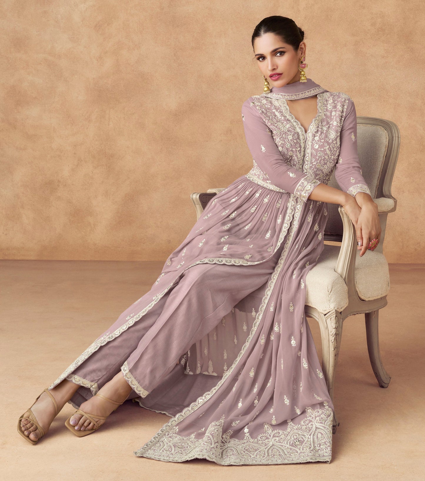 A Woman Modeling Traditional Lavender Anarkali Dupatta Gown