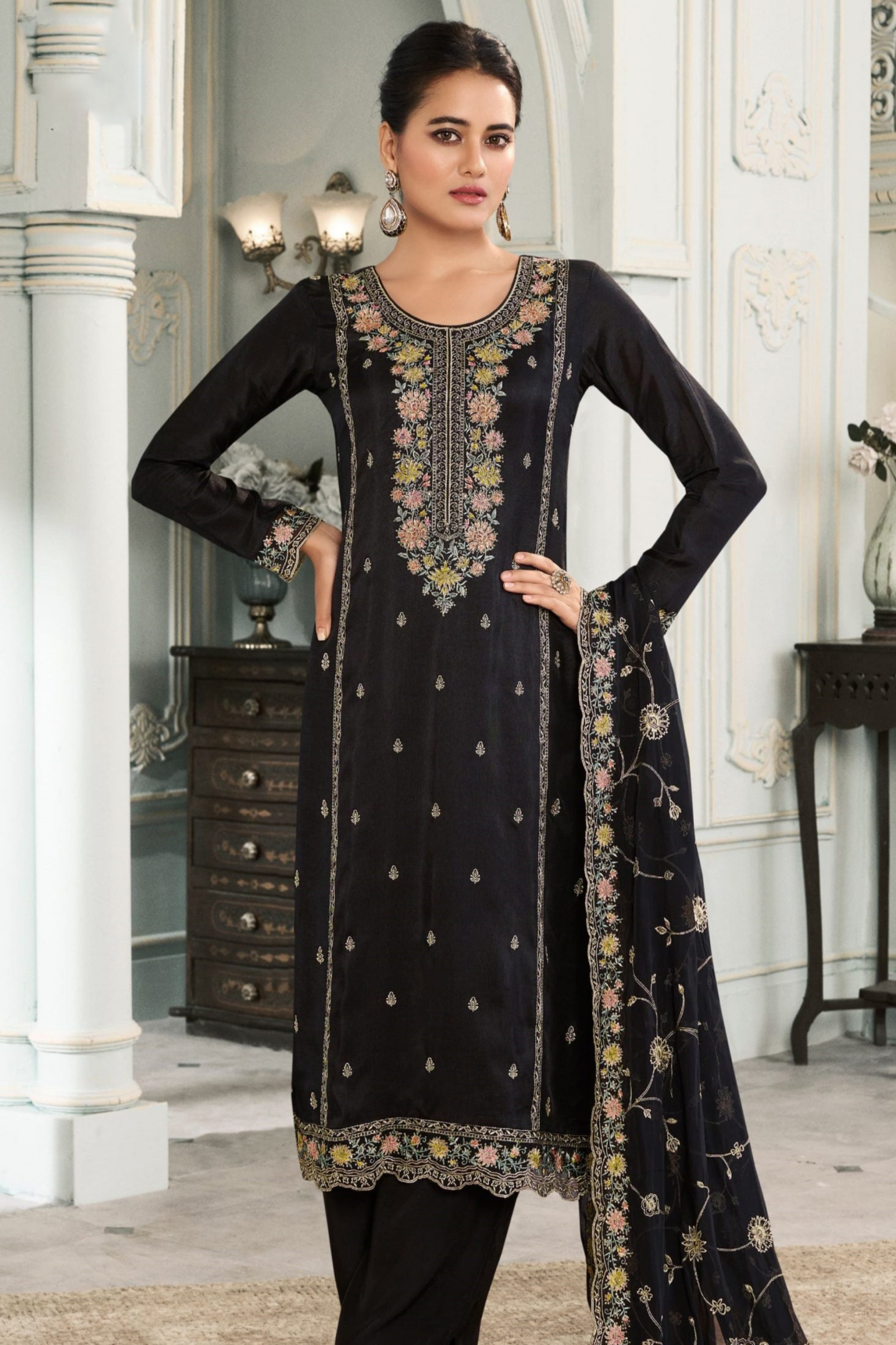 Trendy black embroidered salwar with soft organza dupatta, ideal for parties and special events.