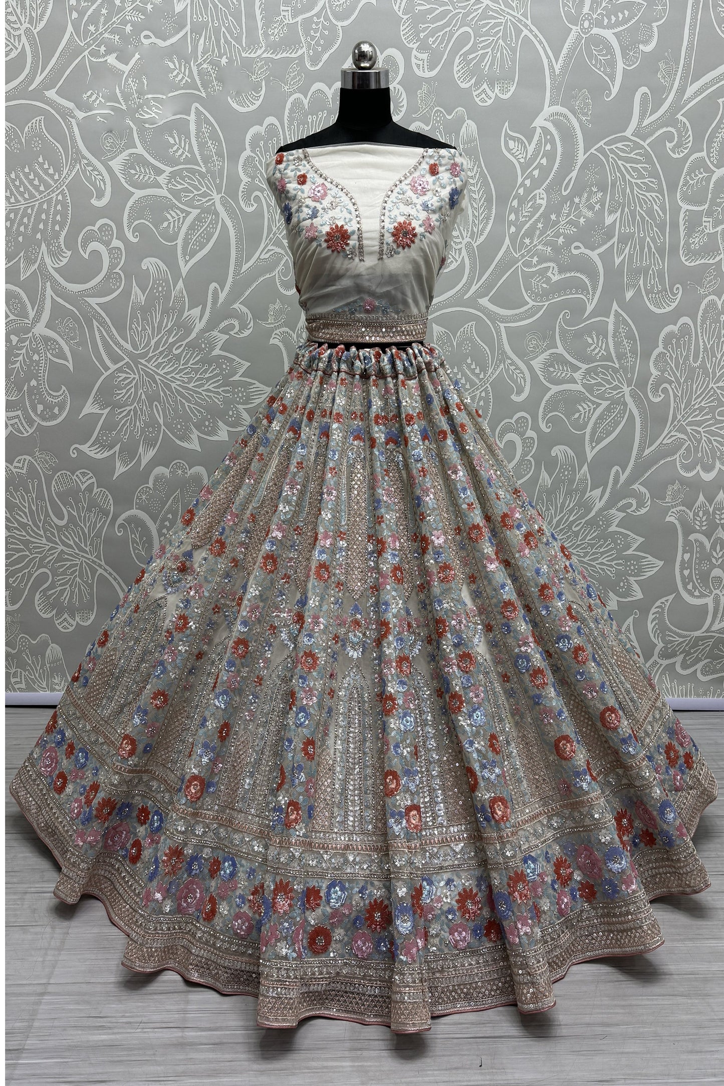 Elegant net lehenga with heavy embroidery for wedding party