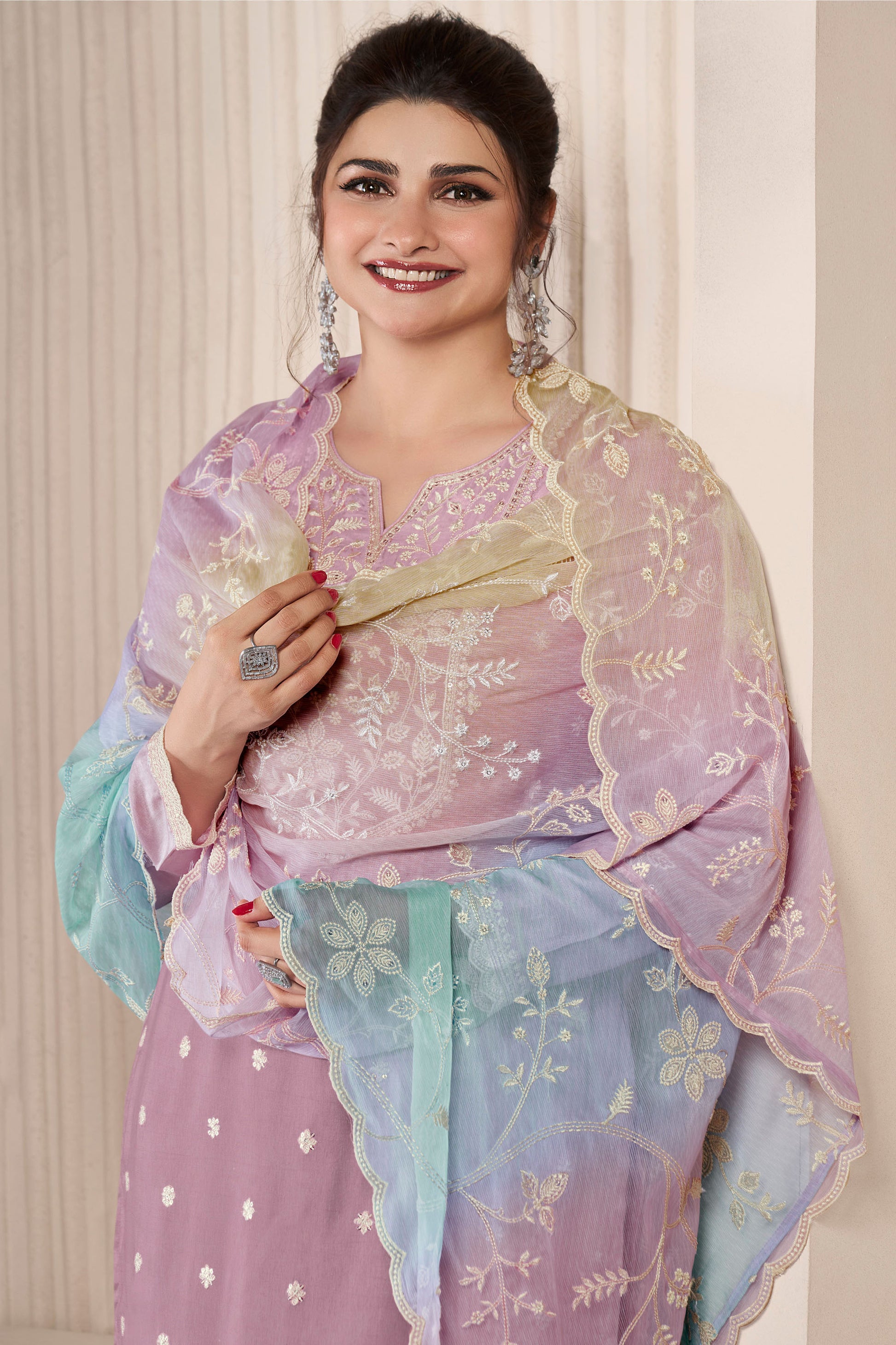 Feminine and fresh, pink salwar kameez range from soft blush tones to vibrant fuchsia.
