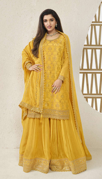 A Woman Wearing  Yellow Indian Salwar Kameez Palazzo Dupatta Dress with Embroidery Work