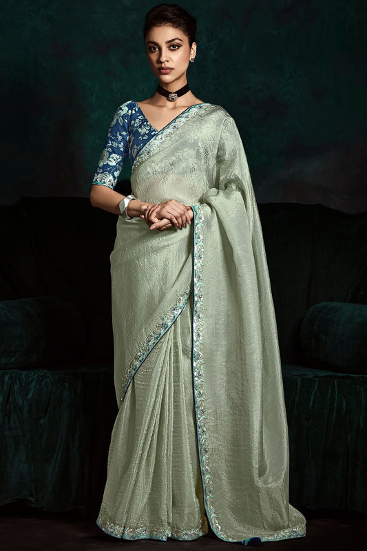 Stunning Pastel Green Embroidery & Sequins Work Saree With Floral Print Blouse For Special Occasion