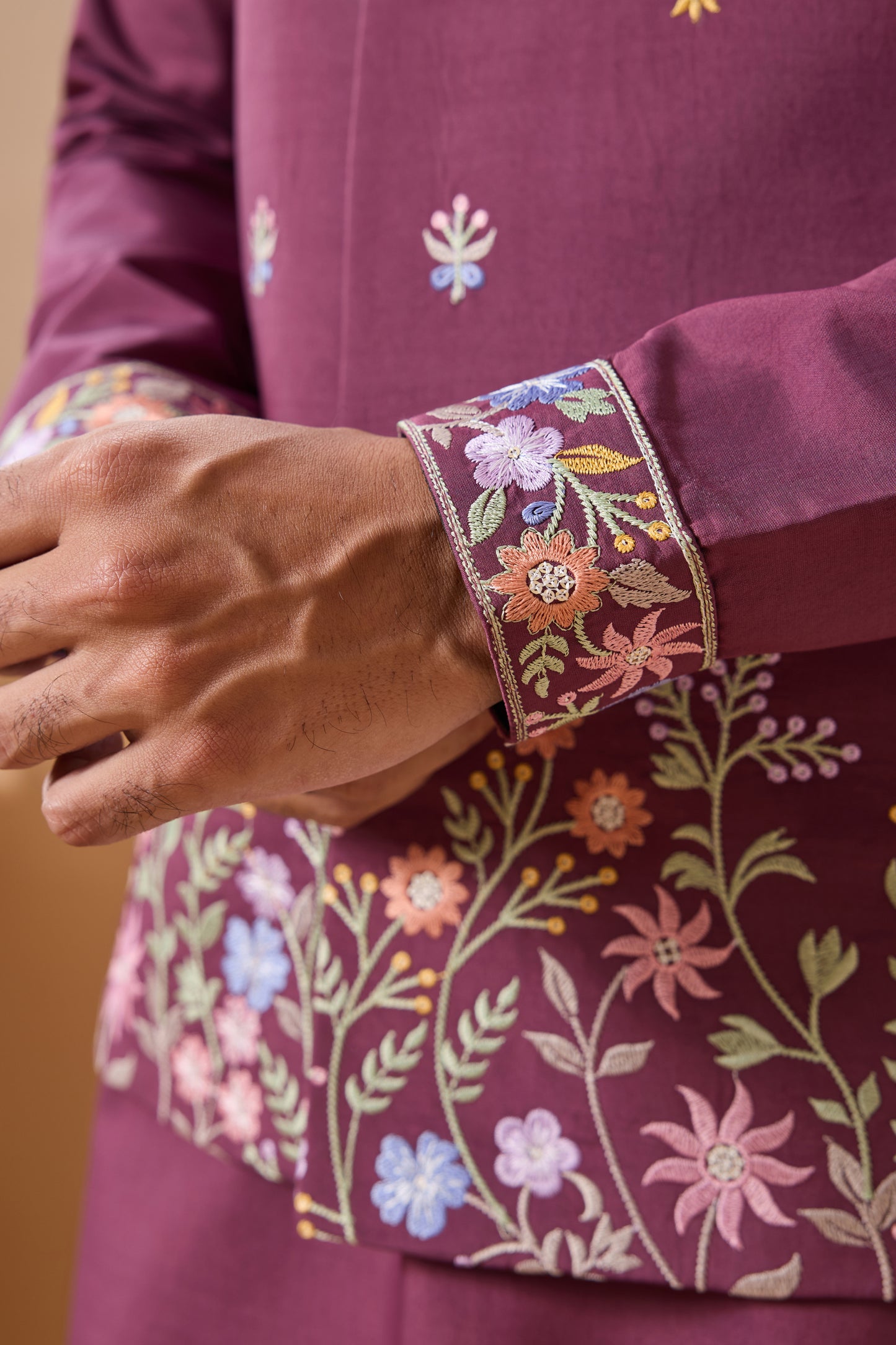 Close-up of sequence embroidered work on pink designer kurta"