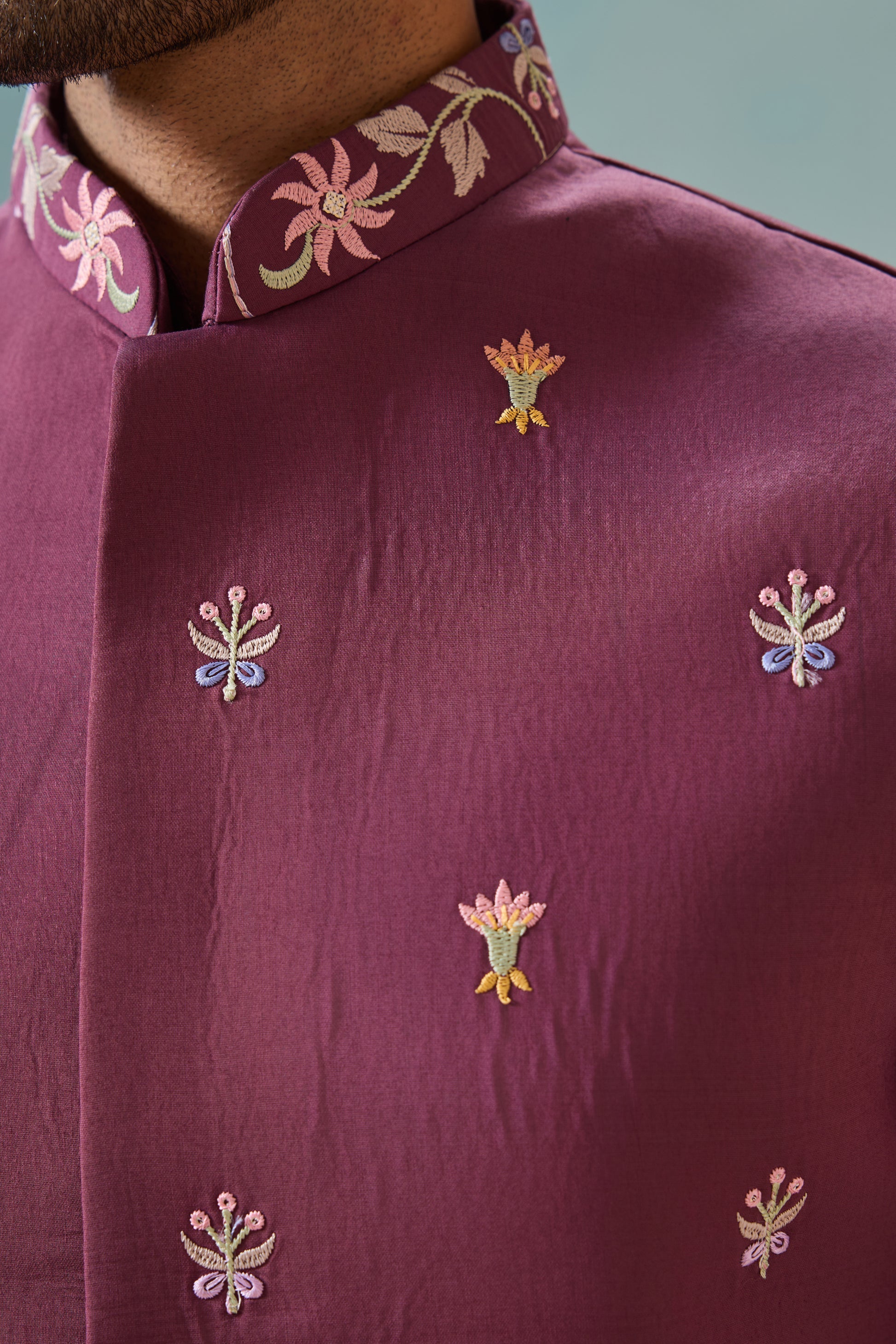 Close-up of sequence embroidered work on pink designer kurta