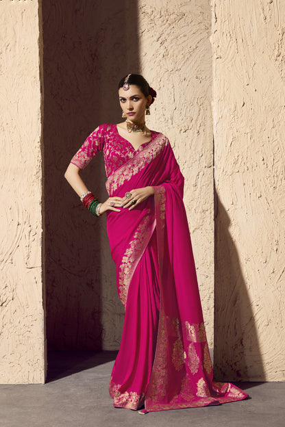 pink art silk saree with gold zari floral border and matching brocade blouse, Traditional Indian wedding guest outfit online USA and UK.