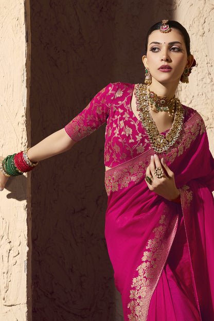 Close-up of pink designer saree blouse with intricate gold weaving and Kundan jewelry styling. Festive ethnic wear for women in Canada